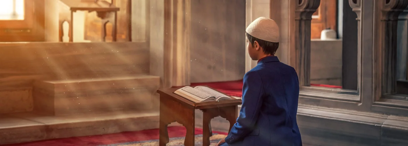 A worshipper in a quiet mosque